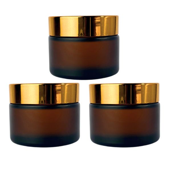 Pote de vidrio esmerilado ámbar con tapa a rosca dorada, blanca o negra y contratapa interna. Envase cosmético de 30g y 50g ideal para cremas, bálsamos y productos de cuidado personal.