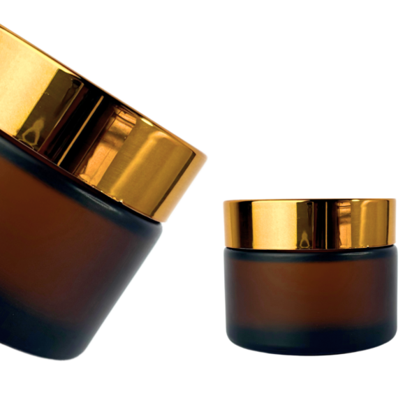 Pote de vidrio esmerilado ámbar con tapa a rosca dorada, blanca o negra y contratapa interna. Envase cosmético de 30g y 50g ideal para cremas, bálsamos y productos de cuidado personal.