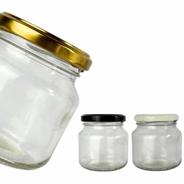 Bollón de vidrio 250ml con tapa metálica a rosca disponible en color dorado, negro o blanco. Frasco de vidrio ideal para conservas, miel, dulces o cosmética natural. Envase reutilizable con diseño clásico y resistente. bollon de vidrio con tapa dorada dorado negra negro blanca blanco 250ml