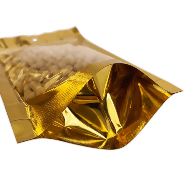 bolsa ziploc dorada, bolsa aluminio con visor, bolsa ziploc una cara transparente, packaging dorado, bolsa metalizada para alimentos, bolsa para snacks, bolsa para café, bolsa hermética, bolsa dorada con cierre, packaging premium, bolsas ziploc para cosméticos, packaging elegante y funcional